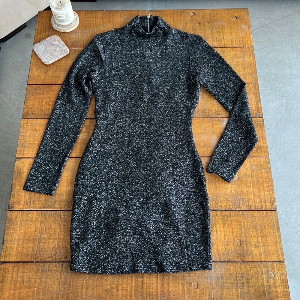 Knitted black and silver stretchy dress with open back